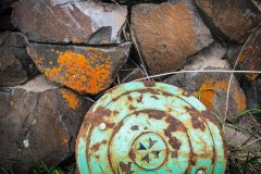 Old metal objects remain on the property.